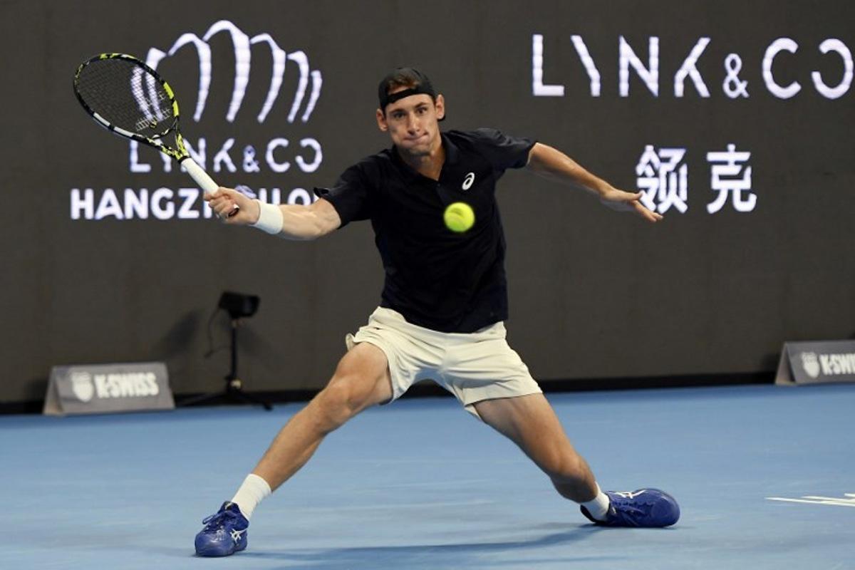France's Valentin Royer hits a return to France's Corentin Moutet during their men's singles semi-final match at the Hangzhou Open tennis tournament in Hangzhou, in China's eastern Zhejiang province on September 22, 2025.  STR / AFP
