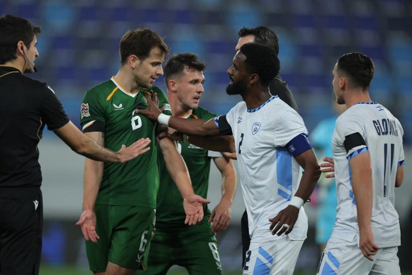Israel's defender #02 Eli Dasa (CR) pushes Republic of Ireland's midfielder #06 Jayson Molumby (2L) during the UEFA Nations League Group B3 football match between the Republic of Ireland and Israel at the TSC Arena in Backa Topola on October 4, 2026.  Pedja Milosavljevic / AFP