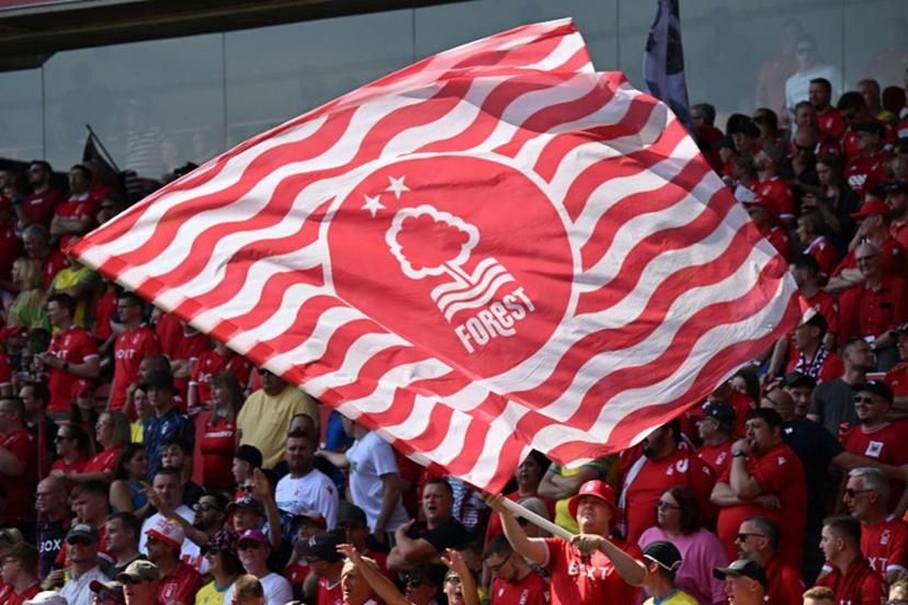 A Forest flag is waved ahead of the English Premier League football match between Nottingham Forest and West Ham United at The City Ground in Nottingham, central England, on August 14, 2022.  Paul ELLIS / AFP