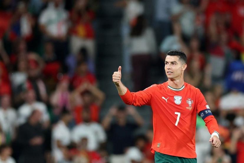 Portugal's forward #16 Cristiano Ronaldo celebrates scoring his team's second goal during the 2026 World Cup qualifiers Europe zone group F football match between Portugal and Hungary at Jose Alvalade stadium in Lisbon on October 14, 2025.  PATRICIA DE MELO MOREIRA / AFP