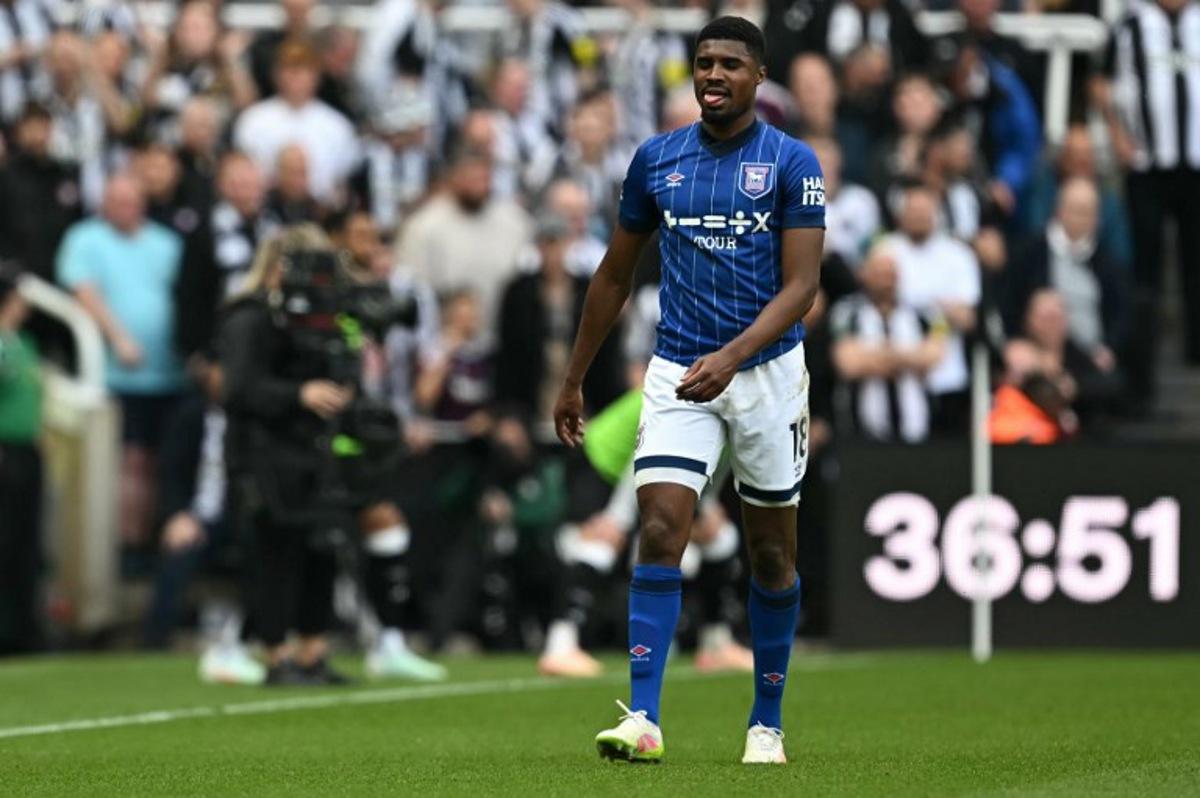 Ipswich Town's English defender #18 Ben Johnson leaves the pitch after being sent off for a second yellow card offence during the English Premier League football match between Newcastle United and Ipswich Town at St James' Park in Newcastle-upon-Tyne, north east England on April 26, 2025.  Paul ELLIS / AFP
