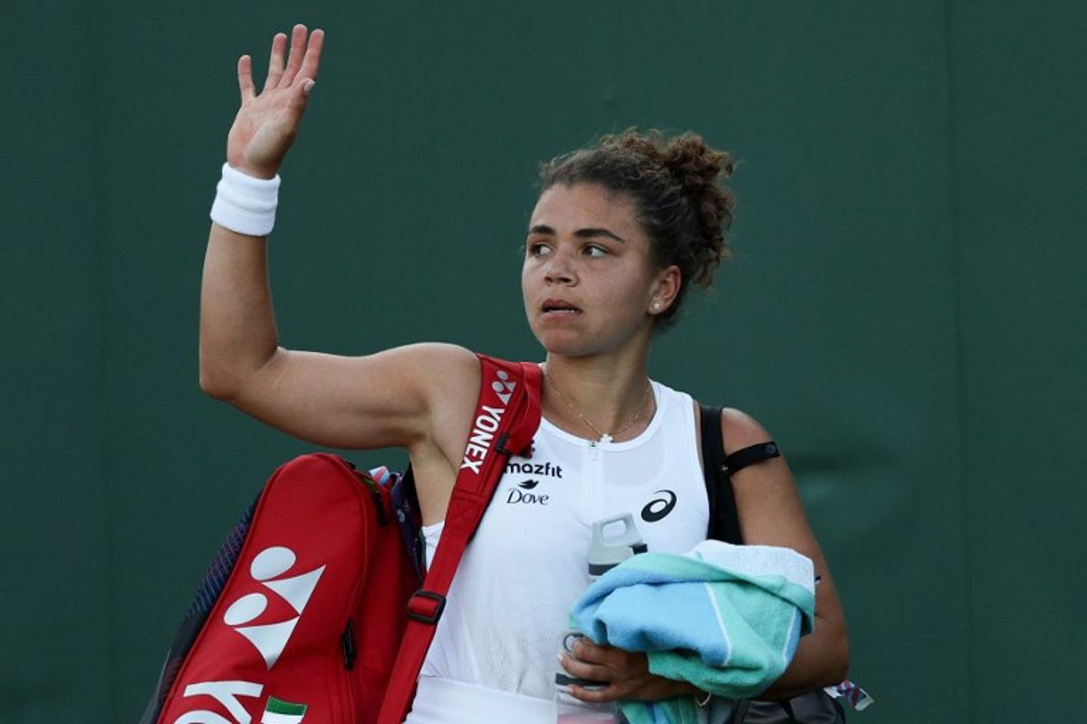 Italy's Jasmine Paolini leaves the court after losing against Russia's Kamilla Rakhimova at the end of their women's singles second round tennis match on the third day of the 2025 Wimbledon Championships at The All England Lawn Tennis and Croquet Club in Wimbledon, southwest London, on July 2, 2025.  Adrian Dennis / AFP