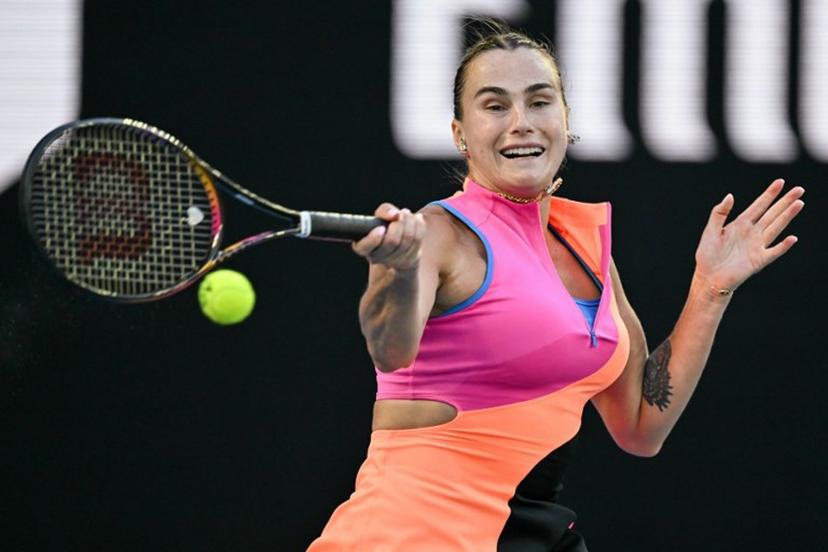 Belarus' Aryna Sabalenka hits a return against France's Tiantsoa Rakotomanga Rajaonah during their women's singles match on day one of the Australian Open tennis tournament in Melbourne on January 18, 2026.  Paul Crock / AFP