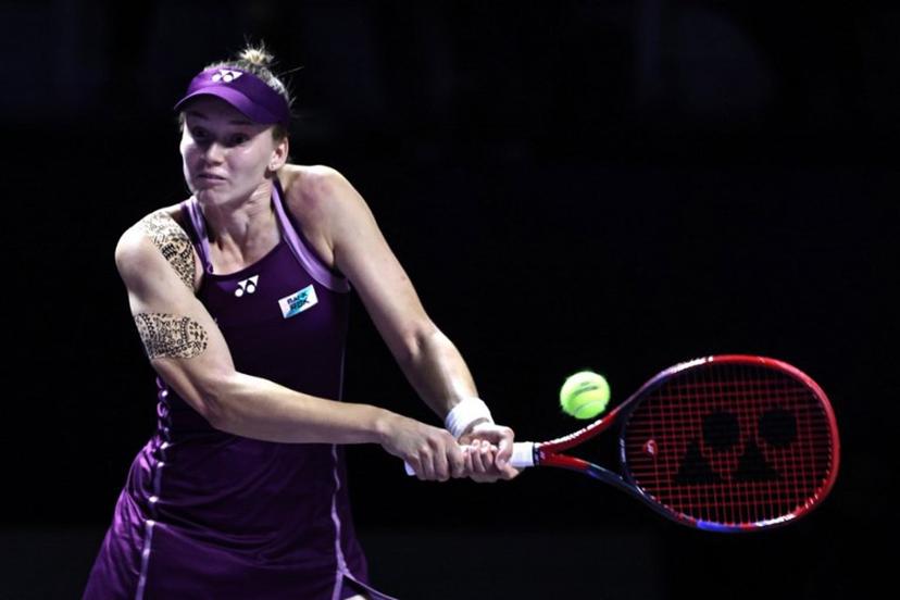 Kazakhstan's Elena Rybakina returns the ball to Russia's Ekaterina Alexandrova during their WTA Finals tennis tournament in Riyadh on November 5, 2025.  Fayez NURELDINE / AFP
