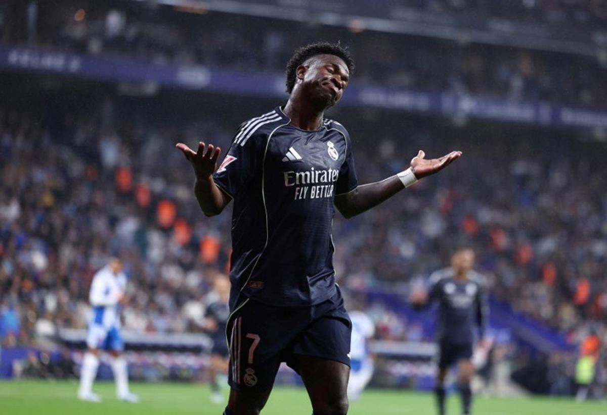 Real Madrid's Brazilian forward #07 Vinicius Junior reacts during the Spanish league football match between RCD Espanyol and Real Madrid CF at RCDE Stadium in Cornella de Llobregat on May 3, 2026.  Josep LAGO / AFP