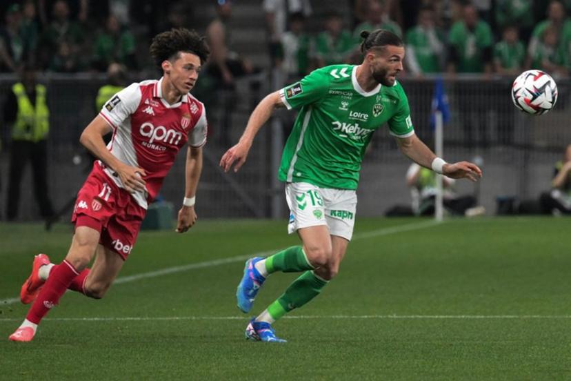 Monaco's French midfielder #11 Maghnes Akliouche (L) fights the ball with Saint Etienne's French defender #19 Leo Petrot (R) during the French L1 football match between AS Saint-Etienne and AS Monaco at the Geoffroy Guichard Stadium in Saint-Etienne, central-eastern France, on May 3, 2025.  JEAN-PHILIPPE KSIAZEK / AFP