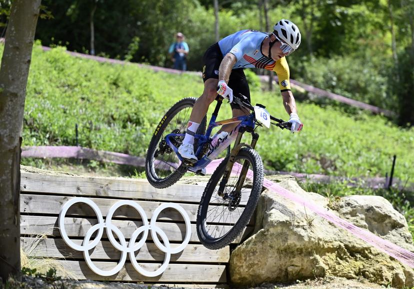 Belgian Jens Schuermans pictured in action during the men's cross-country mountain bike cycling race at the Paris 2024 Olympic Games, at the Colline d'Elancourt climb near Paris, France on Monday 29 July 2024. The Games of the XXXIII Olympiad are taking place in Paris from 26 July to 11 August. The Belgian delegation counts 165 athletes competing in 21 sports. BELGA PHOTO DIRK WAEM