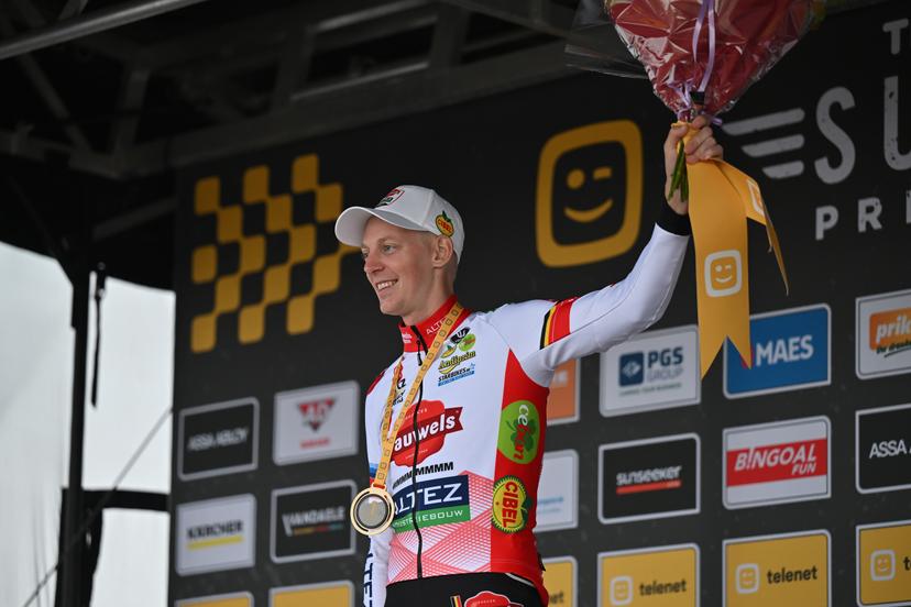 Belgian Michael Vanthourenhout celebrates on the podium after winning the men elite race of the Cyclocross Ruddervoorde, Sunday 19 October 2025 in Ruddervoorde, stage 2 (out of 7) of the Superprestige cyclocross cycling competition. BELGA PHOTO LUC CLAESSEN