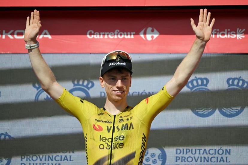 Team Visma-Lease a bike's British rider Matthew Brennan celebrates on the podium after winning the 16th stage of the Vuelta a Espana 2026 cycling tour, a 181,1 km race between Cortegana and the Monastery of Santa Maria de la Rabida in Palos de la Frontera, on September 8, 2026.   JORGE GUERRERO / AFP