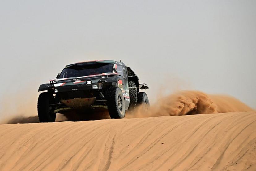 The Dacia Sandriders's Qatari driver Nasser Al‑Attiyah and Belgian co‑pilot Fabian Lurquin compete in the Stage 7 of the 48th edition of the Dakar Rally 2026, between Riyadh and Wadi ad-Dawasir, Saudi Arabia, on January 11, 2026.  Giuseppe CACACE / AFP