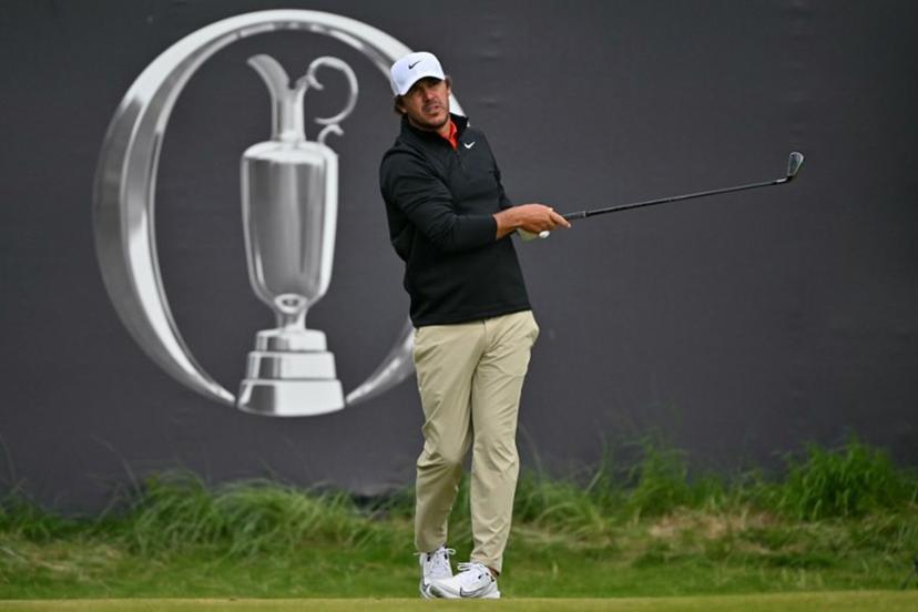 US golfer Brooks Koepka watches his shot from the 1st tee on the opening day of the 153rd Open Championship at Royal Portrush golf club in Northern Ireland on July 17, 2025.  Glyn KIRK / AFP