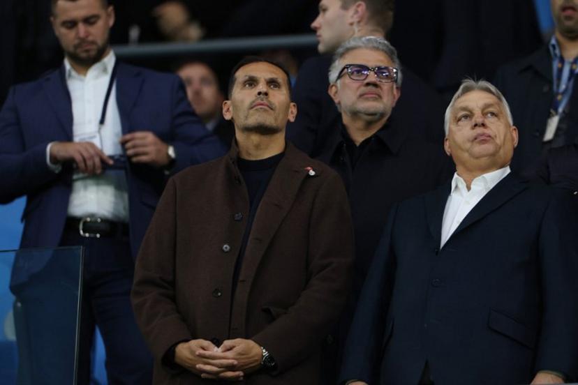 Manchester City's Emirati chairman Khaldoon al-Mubarak (L) and Hungary's Prime Minister Viktor Orban (R) watches from the stands during the English Premier League football match between Manchester City and Liverpool at the Etihad Stadium in Manchester, north west England, on November 9, 2025.  Darren Staples / AFP