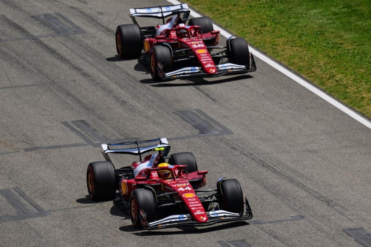 Ferrari's British driver Lewis Hamilton (Front) and Ferrari's Monegasque driver Charles Leclerc race during a practice session for the 2025 Emilia Romagna Formula One Grand Prix at the Imola autodrome in Imola, on May 17, 2025.   Andrej ISAKOVIC / AFP