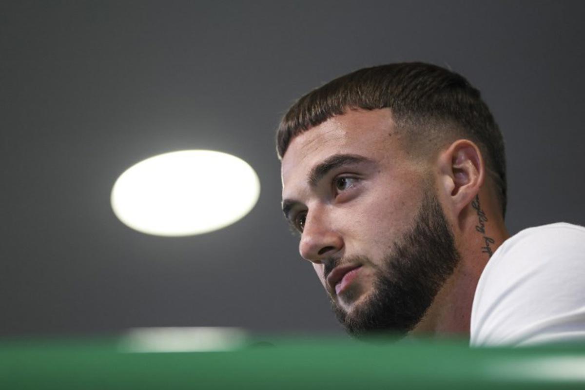 Sporting Lisbon's Belgian defender Zeno Debast speaks during a press conference on the eve of the UEFA Champions League first round day 1 football match between Sporting CP and Kairat Almaty at Alvalade stadium in Lisbon on September 17, 2025.  PATRICIA DE MELO MOREIRA / AFP