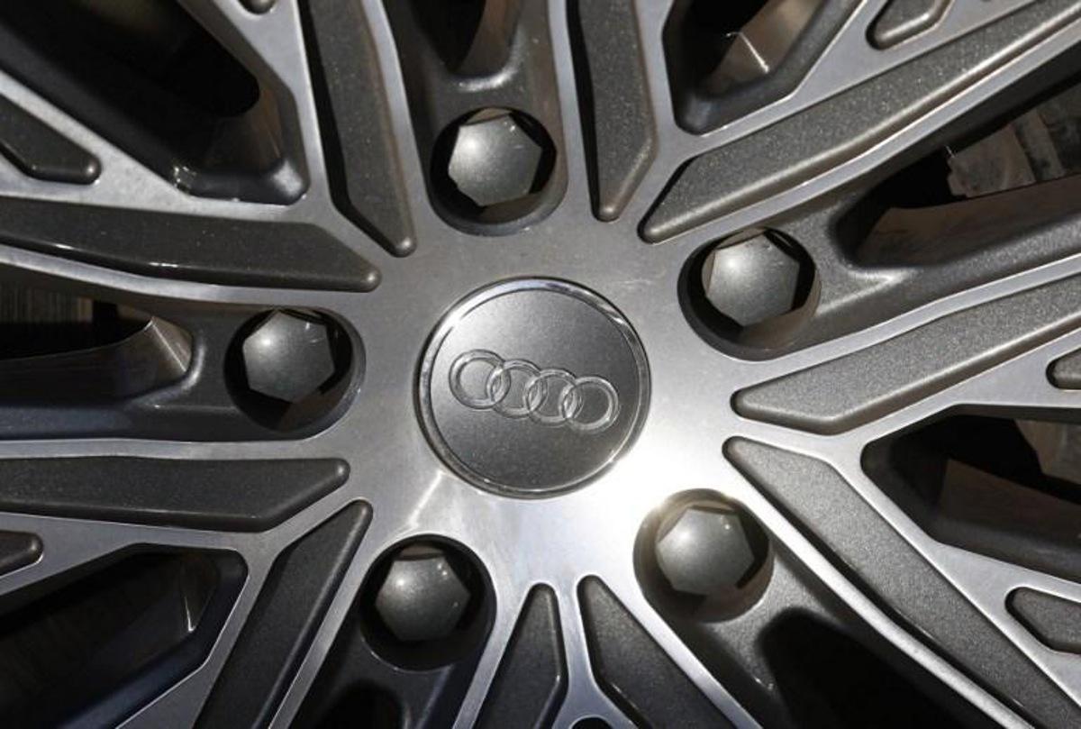 The logo of German carmaker Audi is seen on the wheel rim of a car, on January 21, 2021 in Berlin.  Odd ANDERSEN / AFP