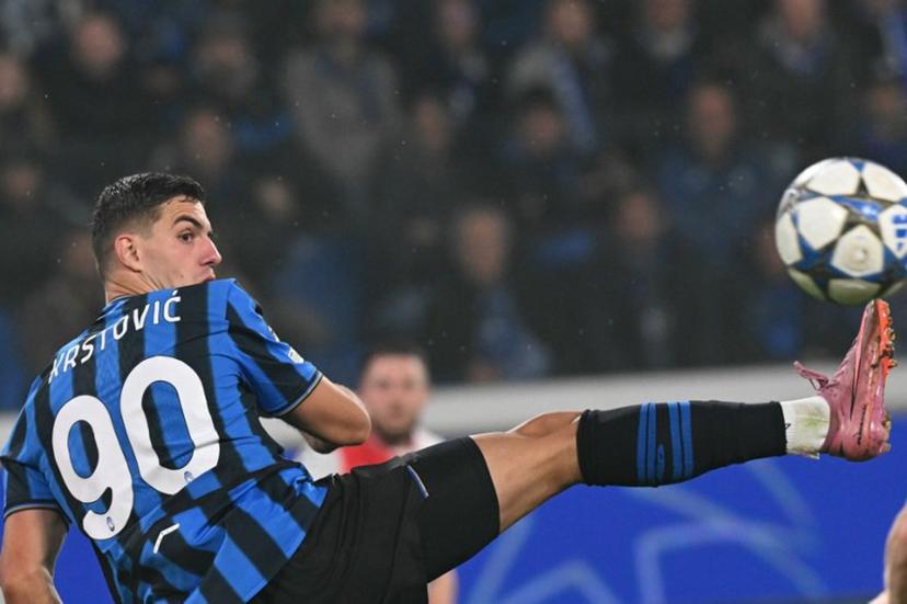 Atalanta's Montenegrin forward #90 Nikola Krstovic controls the ball during the UEFA Champions League phase day 3 football match between Atalanta and Slavia Praga at the Gewiss stadium in Bergamo, on October 22, 2025.   Stefano RELLANDINI / AFP