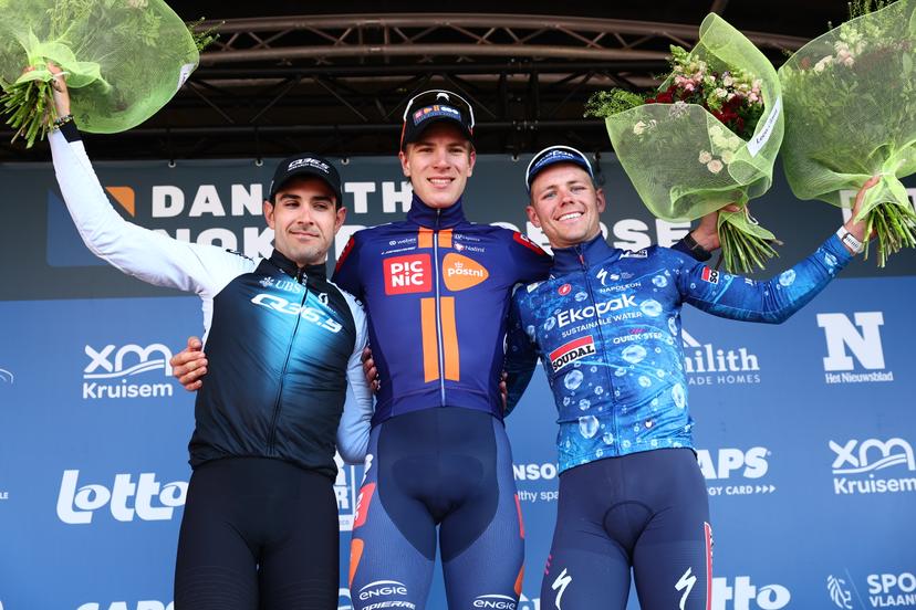 L-R, second Italian Matteo Moschetti of Q36.5 Pro Cycling Team, winner Dutch Nils Eekhoff of Team Picnic PostNL and third US Luke Lamperti of Soudal Quick-Step celebrate on the podium of the 'Nokere Koerse' one day cycling race for men elite, 188.1 km from Deinze to Nokere, on Wednesday 19 March 2025. BELGA PHOTO DAVID PINTENS