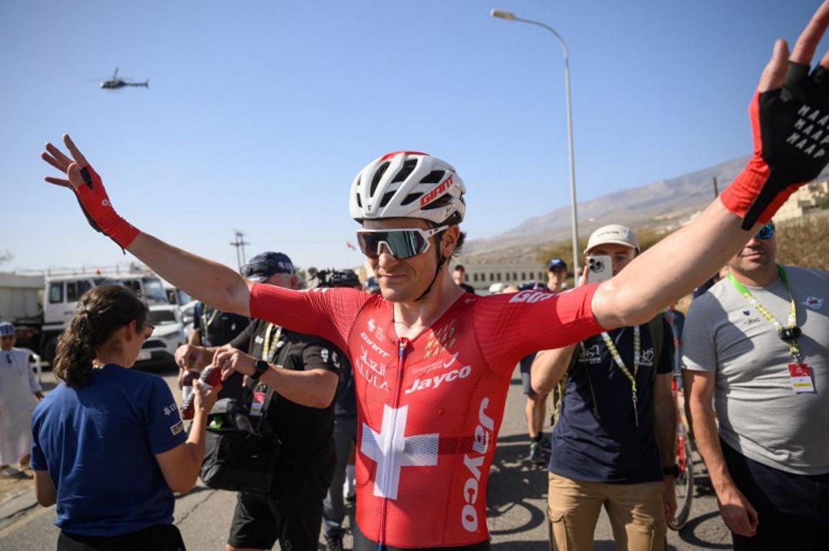 Team Jayco AlUla Swiss rider Mauro Schmid celebrates after winning the 3d stage of the Tour of Oman cycling race from Samail "Al Fayhaa Resthouse" to Misfat Al Abriyeen, on February 9, 2026.  Loic VENANCE / AFP