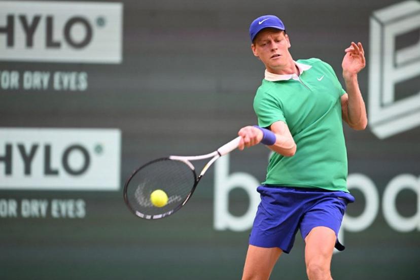 Kazakhstan's Alexander Bublik plays the ball to Italy's Jannik Sinner in their men's singles tennis match during the Halle Open ATP tennis tournament in Halle, on June 19, 2025.  CARMEN JASPERSEN / AFP