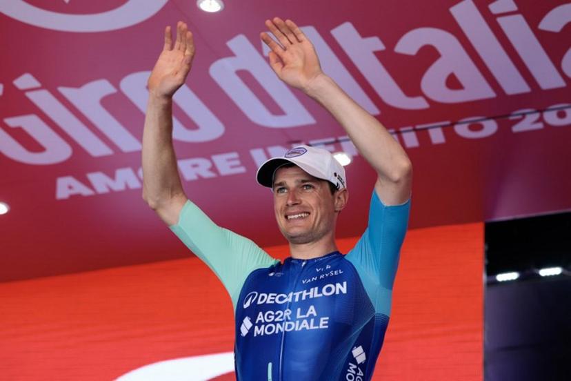 Decathlon AG2R La Mondiale Team's French rider Nicolas Prodhomme celebrates on the podium after victory in the 19th stage of the 108th Giro d'Italia cycling race of 166kms from Biella to Champoluc on May 30, 2025.  Luca Bettini / AFP