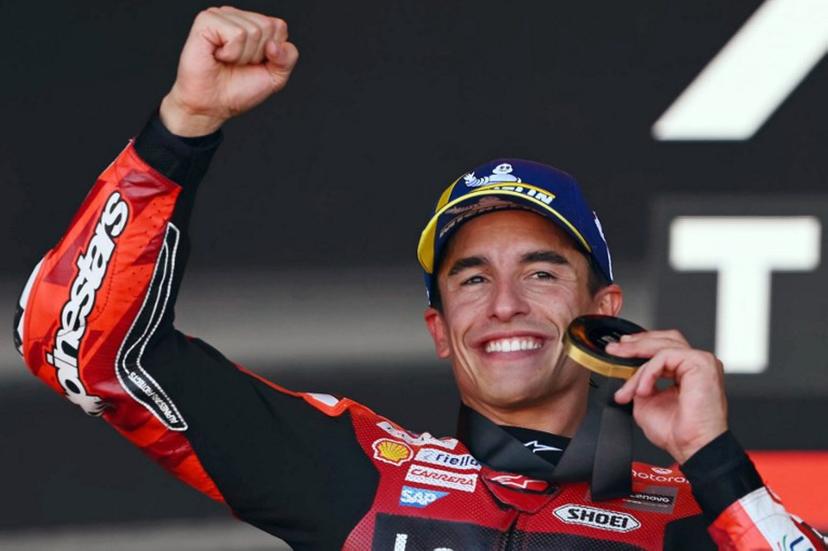 Team Ducati Lenovo Team's Marc Marquez celebrates winning the sprint race of the MotoGP Aragon Grand Prix at the Motorland circuit in Alcaniz, northeastern Spain, on August 29, 2026.  JOSE JORDAN / AFP
