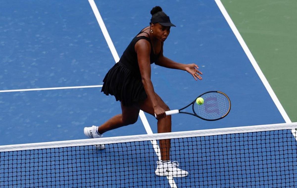 USA's Venus Williams plays a shot during the women's doubles quarterfinal match with Canada's Leylah Fernandez against USA's Taylor Townsend and Czech Republic's Kateřina Siniaková at the US Open tennis tournament at the USTA Billie Jean King National Tennis Center in New York City on September 2, 2025.  Kena Betancur / AFP