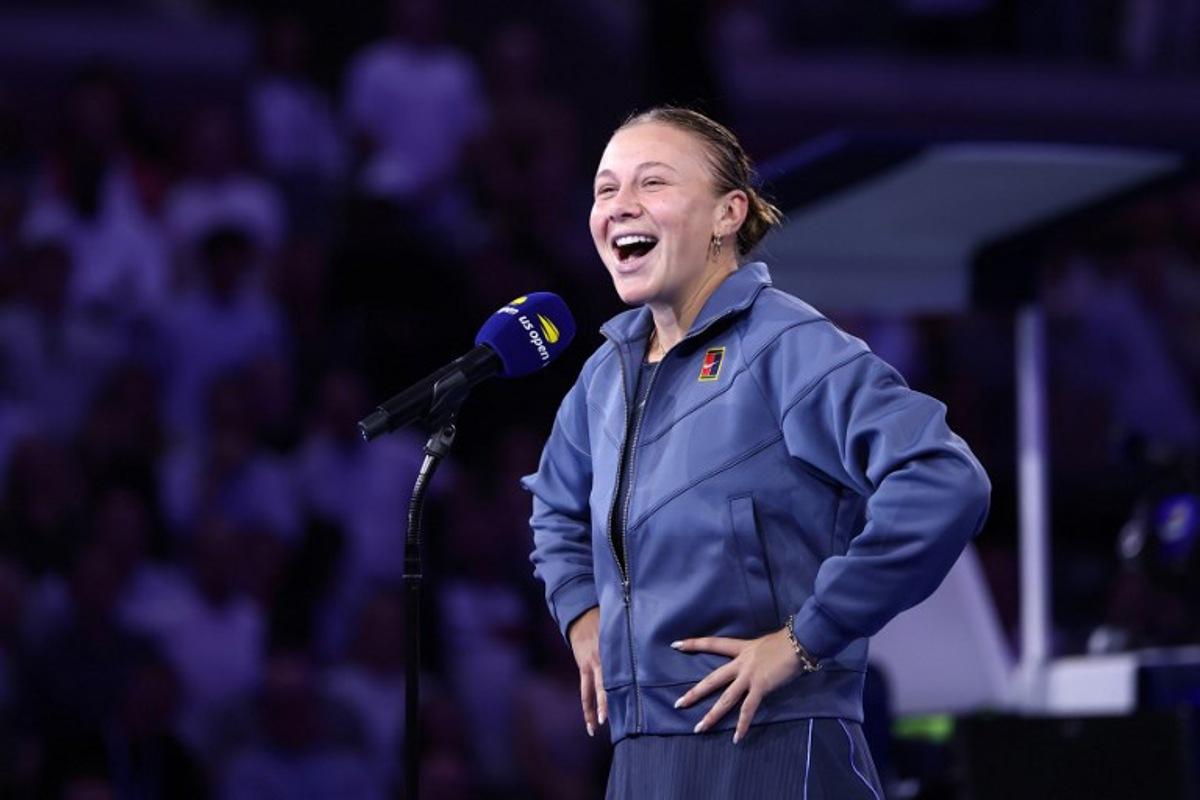 USA's Amanda Anisimova speaks after coming in second to Belarus's Aryna Sabalenka during their women's singles final tennis match on day fourteen of the US Open tennis tournament at the USTA Billie Jean King National Tennis Center in New York City, on September 6, 2025.  CHARLY TRIBALLEAU / AFP