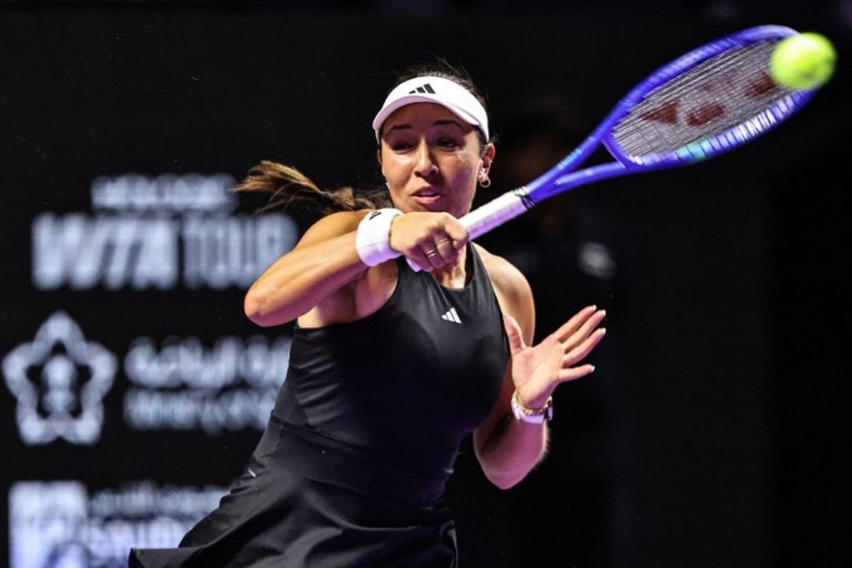 USA's Jessica Pegula hits a return against USA's Coco Gauff during their tennis match at the WTA Finals in Riyadh on November 2, 2025.  Fayez NURELDINE / AFP