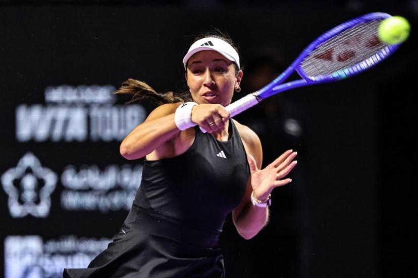 USA's Jessica Pegula hits a return against USA's Coco Gauff during their tennis match at the WTA Finals in Riyadh on November 2, 2025.  Fayez NURELDINE / AFP