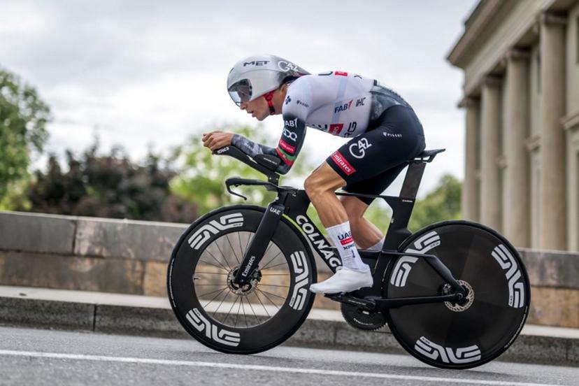 Portugal's Joao Pedro Almeida rides during the fith stage of the Tour of Romandie UCI cycling World tour, 17.1 km loop from the start to the finish in Geneva on May 4, 2025.   Fabrice COFFRINI / AFP
