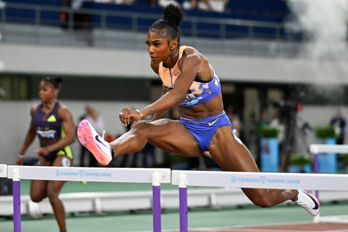 USA's Masai Russell competes in the women's 100m hurdles event during the Shanghai/Keqiao Diamond League athletics meeting in Keqiao, Shaoxing in China's eastern Zhejiang province on May 16, 2026.  WANG Zhao / AFP