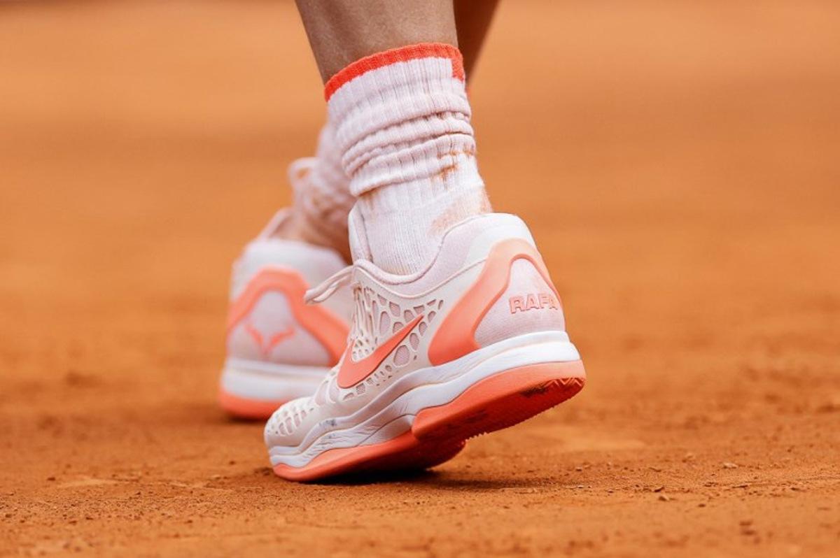 This photograph shows Spain's Rafael Nadal's shoes during the third round of the 2024 ATP Tour Madrid Open tournament tennis match at Caja Magica in Madrid on April 29, 2024.  OSCAR DEL POZO / AFP