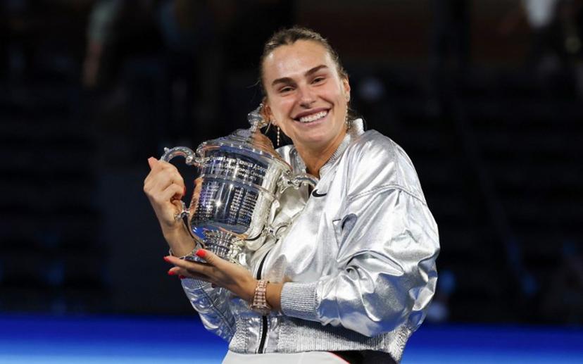Belarus's Aryna Sabalenka poses with the trophy after defeating USA's Amanda Anisimova during their women's singles final tennis match on day fourteen of the US Open tennis tournament at the USTA Billie Jean King National Tennis Center in New York City, on September 6, 2025.  TIMOTHY A.CLARY / AFP