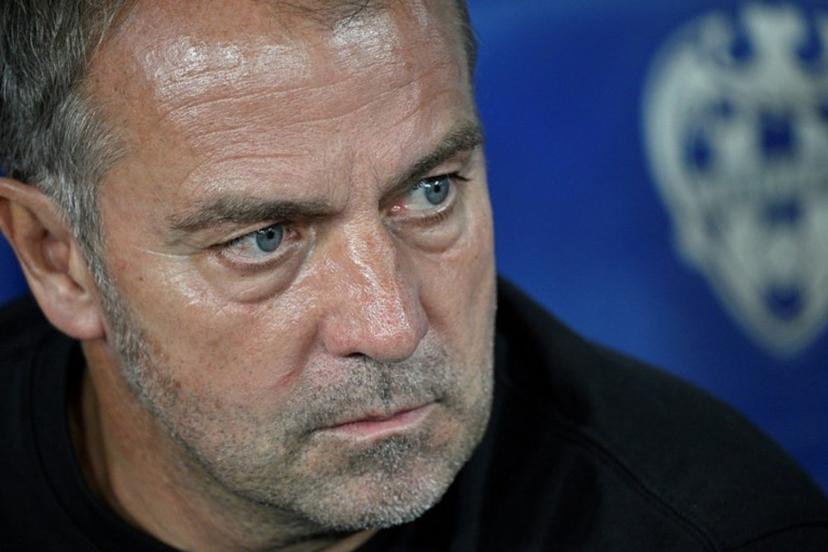 Barcelona's German coach Hans-Dieter Flick looks on prior the Spanish league football match between Levante UD and FC Barcelona at Ciutat de Valencia Stadium in Valencia on August 23, 2025.  Jose JORDAN / AFP