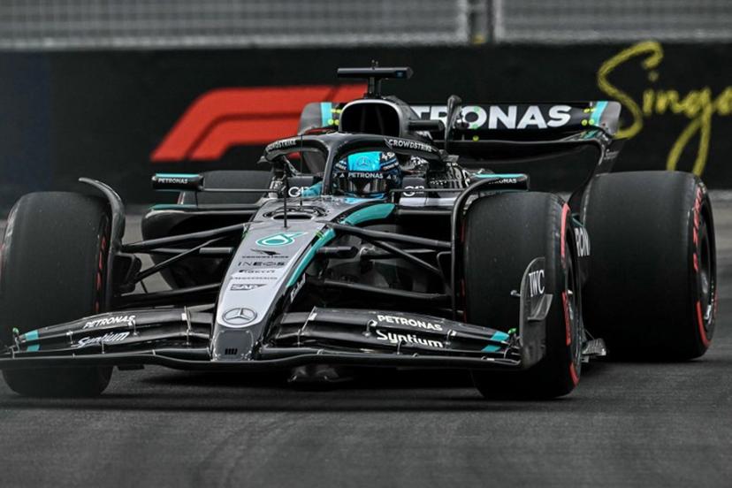 Mercedes' British driver George Russell drives during the third practice session ahead of the Formula One Singapore Grand Prix night race at the Marina Bay Street Circuit in Singapore on October 4, 2025.  Lillian SUWANRUMPHA / AFP