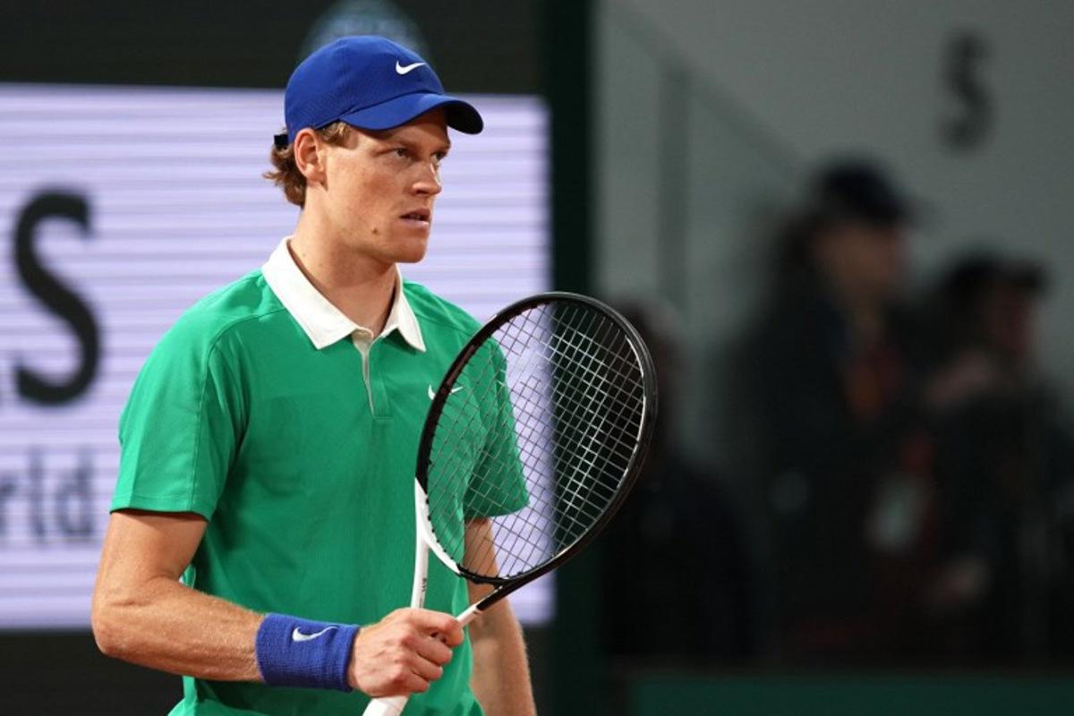Italy's Jannik Sinner reacts during his men's singles match against France's Arthur Rinderknech on day 2 of the French Open tennis tournament on Court Philippe-Chatrier at the Roland-Garros Complex in Paris on May 26, 2025.  Dimitar DILKOFF / AFP