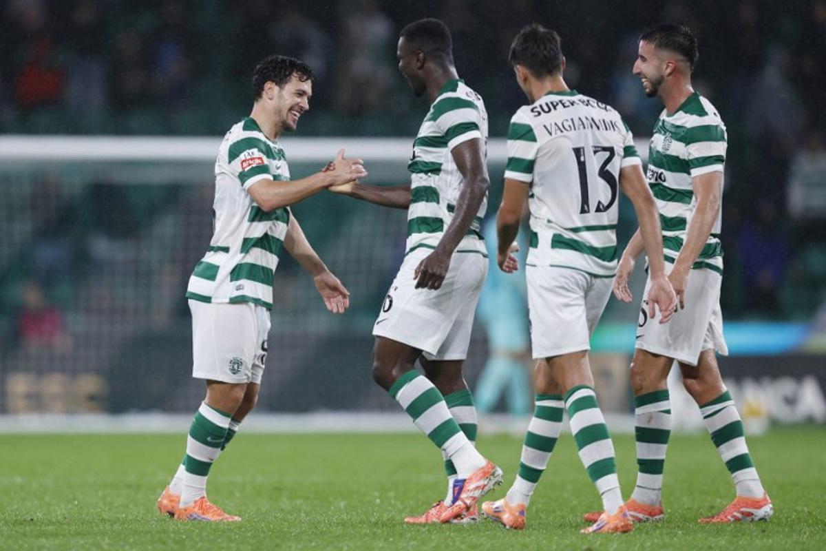 Sporting Lisbon's Portuguese forward #08 Pedro Goncalves (L) celebrates scoring his team's second goal during the Portuguese League football match between Sporting CP and FC Alverca at Jose Alvalade stadium in Lisbon on October 31, 2025.  FILIPE AMORIM / AFP