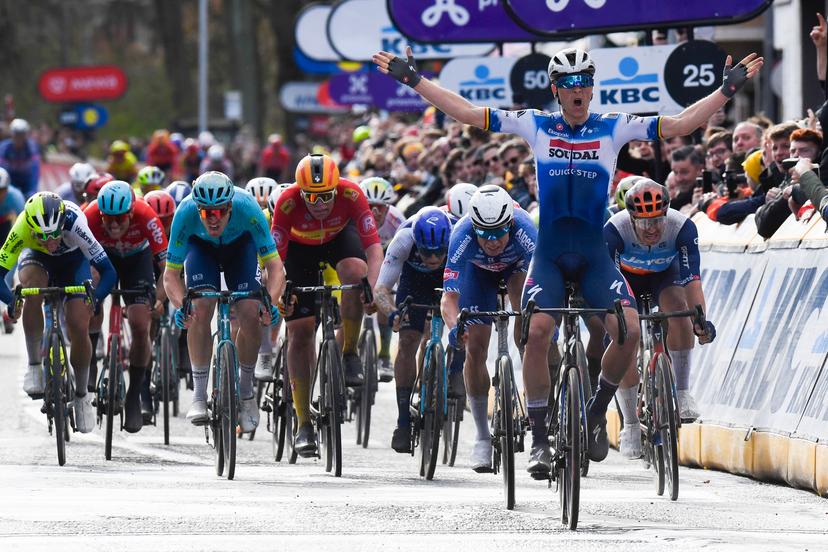Belgian Tim Merlier of Soudal Quick-Step celebrates as he crosses the finish line to win the start of the men's race of the 112th edition of the 'Scheldeprijs' one day cycling event, 205,3 km from Terneuzen, the Netherlands to Schoten, Belgium on Wednesday 03 April 2024. BELGA PHOTO MARC GOYVAERTS