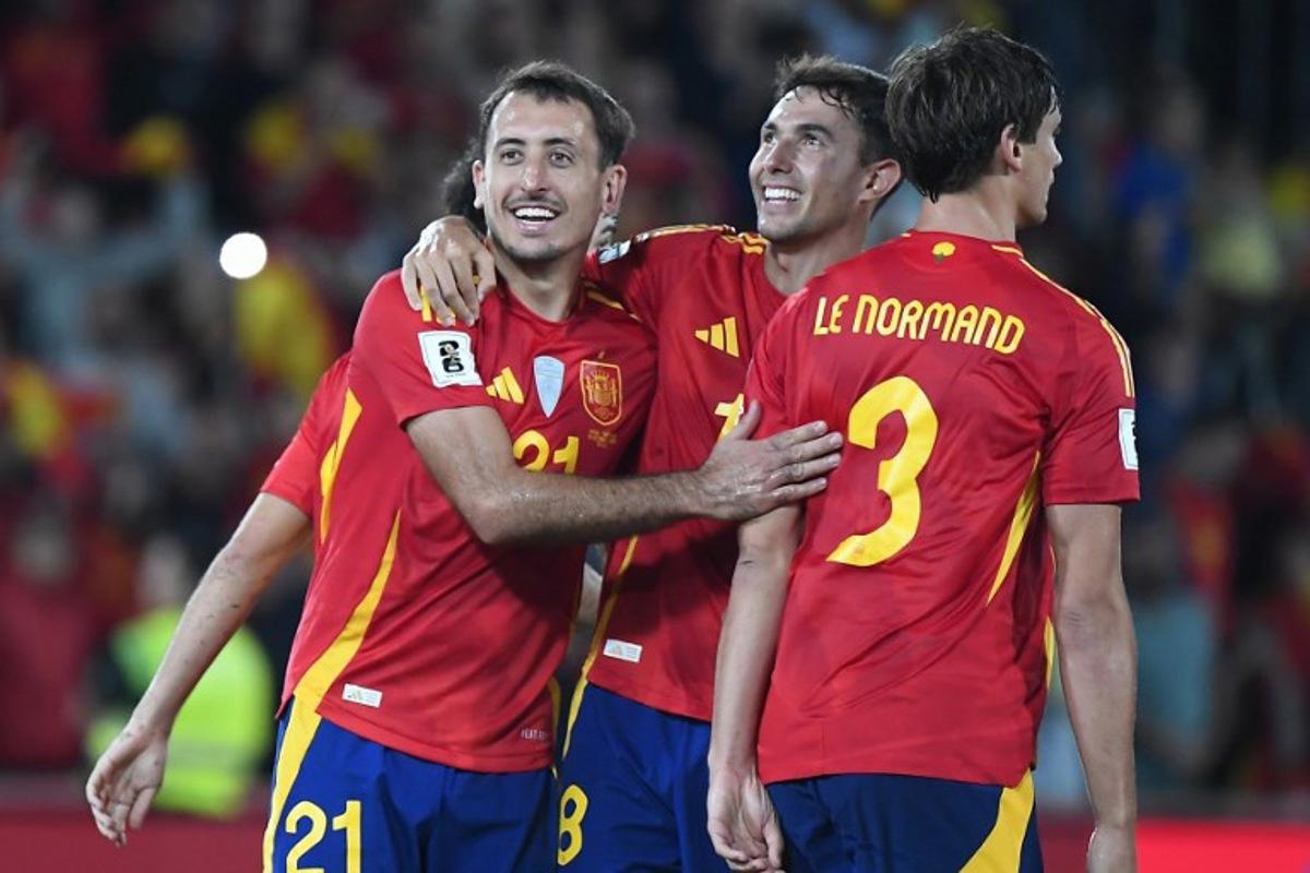 Spain's forward #21 Mikel Oyarzabal celebrates scoring his team's second goal during the 2026 World Cup qualifier Europe zone group E football match between Spain and Georgia at Manuel Martinez Valero stadium in Elche on October 11, 2025.  Jose Jordan / AFP