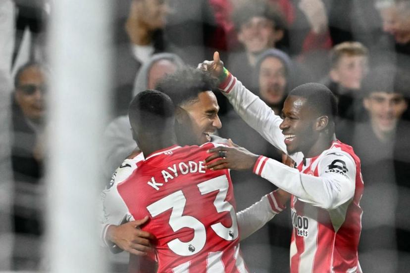Brentford's German midfielder #07 Kevin Schade (2L) celebrates scoring their second goal for 2-0 during the English Premier League football match between Brentford and Liverpool at the Gtech Community Stadium in London on October 25, 2025.  Glyn KIRK / AFP