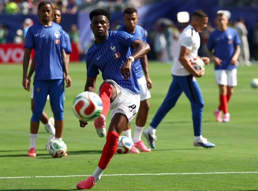 France's midfielder #08 Aurelien Tchouameni warms up ahead of the 2026 World Cup round of 32 football match between France and Sweden at the New York/New Jersey Stadium in East Rutherford on June 30, 2026.   FRANCK FIFE / AFP