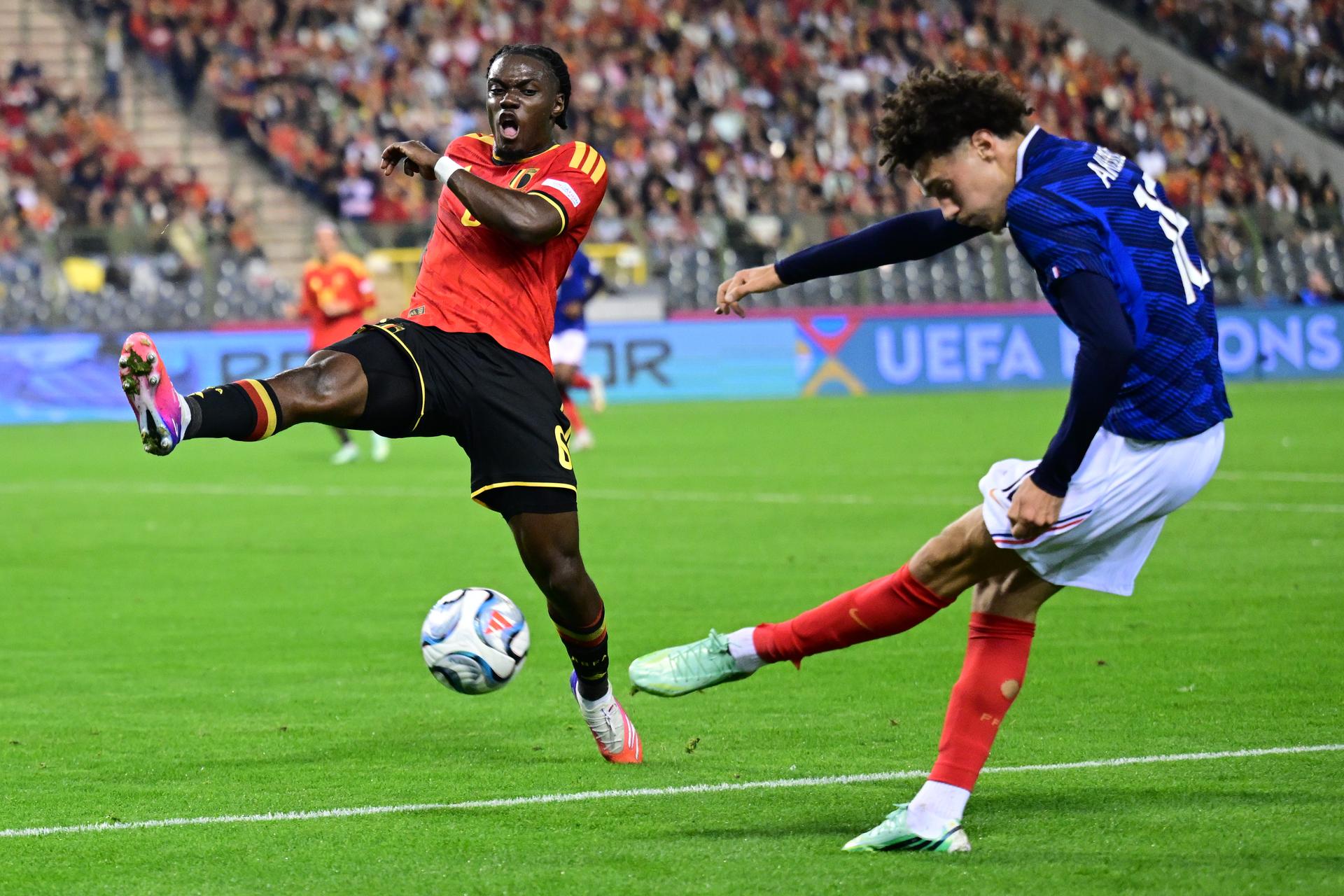 Belgium's Romeo Lavia and France's Maghnes Akliouche pictured during a soccer game between Belgian national team Red Devils and France, on Monday 28 September 2026  in Brussels, the second game of the UEFA Nations League group stage. BELGA PHOTO DIRK WAEM
