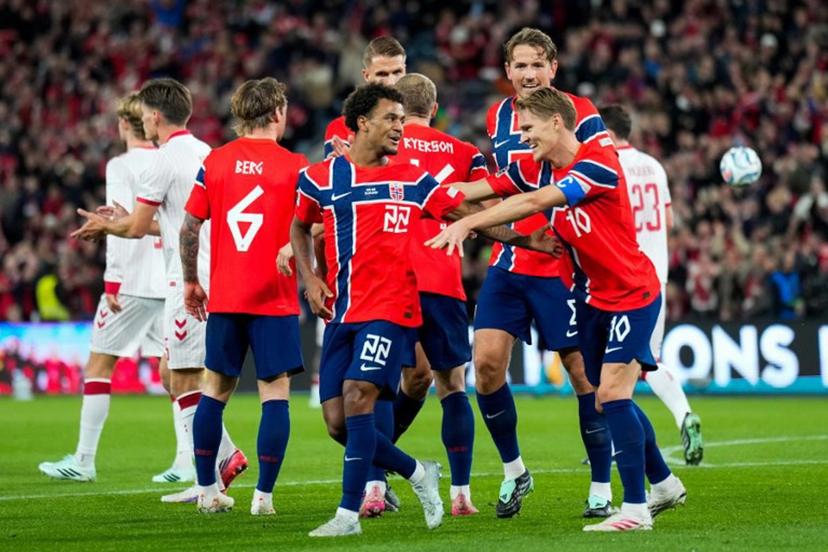 Norway's midfielder #22 Oscar Bobb (C) celebrates scoring his team's first goal with teammates during the UEFA Nations League Group A4 football match between Norway and Denmark in Oslo on September 24, 2026.  Fredrik Varfjell / NTB / AFP