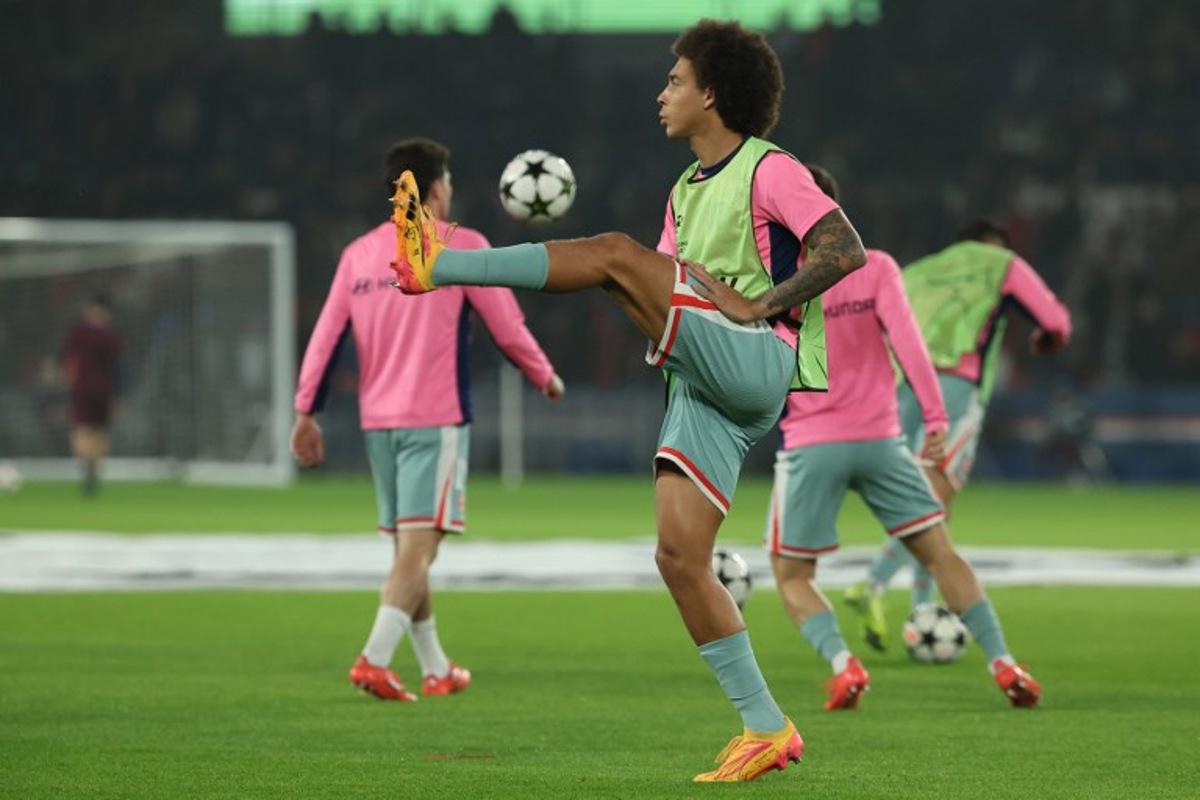 Atletico Madrid's Belgian midfielder #20 Axel Witsel warms up prior to the UEFA Champions League, League phase - Matchday 4, football match between Paris Saint-Germain (PSG) and Atletico Madrid, at the Parc des Princes stadium in Paris on November 6, 2024.  FRANCK FIFE / AFP