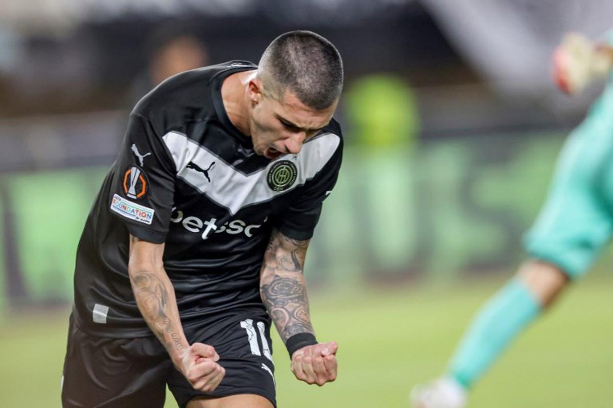 OFI's Spanish forward #10 Aitor Cantalapiedra celebrates his team's first goal during the UEFA Europa League first round football match between OFI Crete FC and TSG 1899 Hoffenheim at Pankritio stadium in Heraklion on September 17, 2026.  Costas Metaxakis / AFP