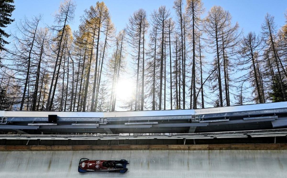 France's team competes in the 2-women Bobsleigh race at the IBSF Bobsleigh and Skeleton World Cup during Milano Cortina 2026 Olympic Games, test event, in Cortina, on November 23, 2025.  Stefano RELLANDINI / AFP