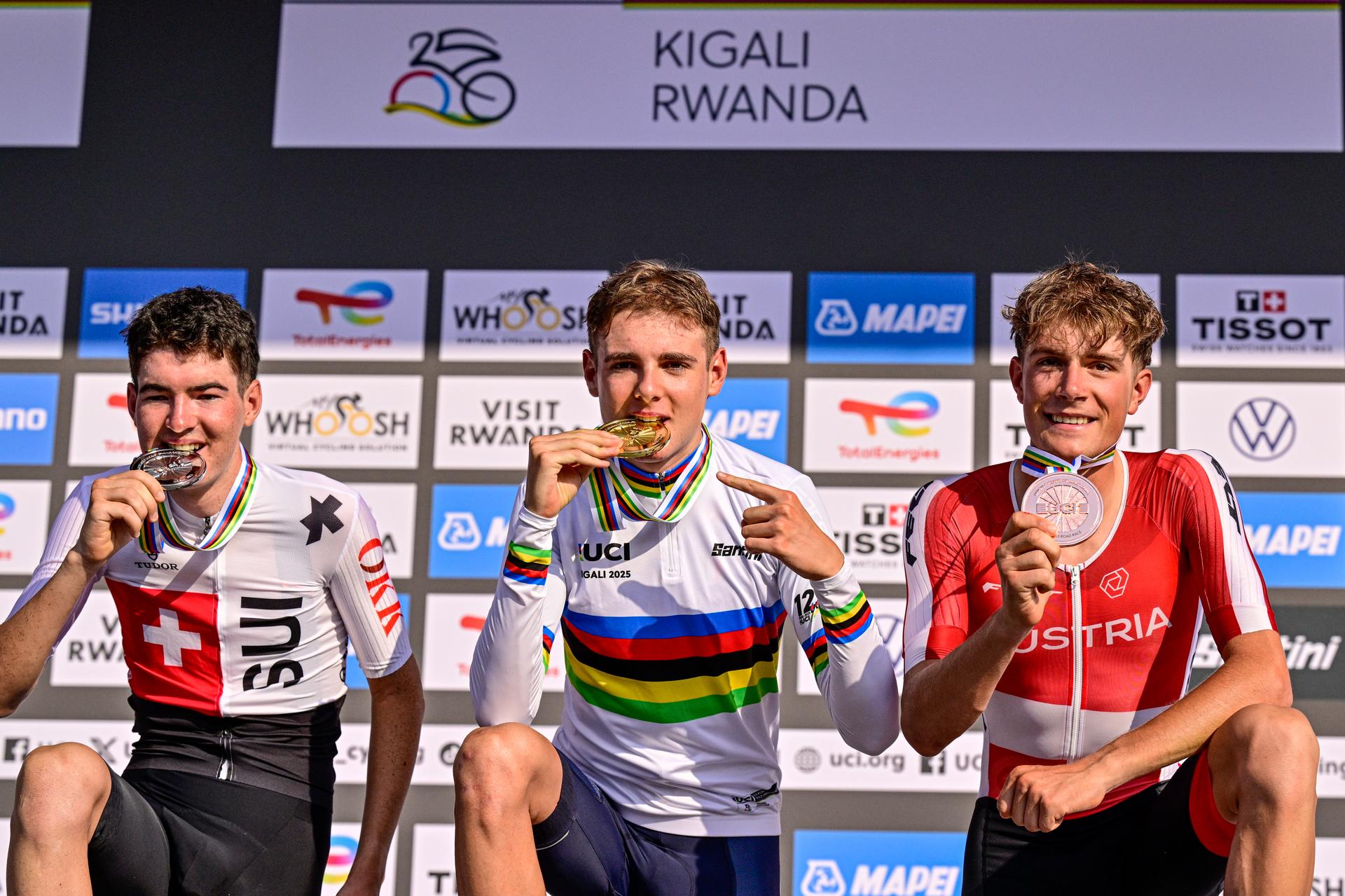 Marco Schrettl, Italian Lorenzo Finn and Jan Huber pictured on the podium after the u23 men road race (164,6 km) at the cycling road World Championships in Kigali, Rwanda, Friday 26 September 2025. The 2025 UCI Road World Championships take place from 21 to 28 September in Kigali, Rwanda. BELGA PHOTO DIRK WAEM