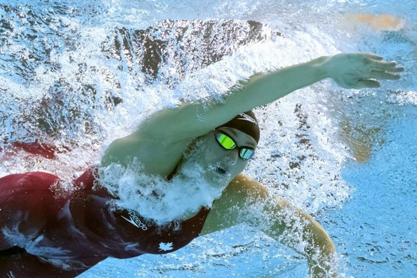 Canada's Penny Oleksiak competes in a heat for the women's 200m freestyle event during the Budapest 2022 World Aquatics Championships at Duna Arena in Budapest on June 20, 2022.  François-Xavier MARIT / AFP