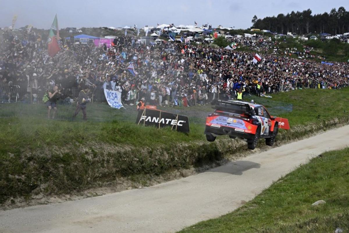 Estonian Ott Tanak and his co-driver Estonian Martin Jarveoja compete in their Hyundai i20N Rally 1 during the SS21 stage of the World Rally Championship (WRC) Rally of Portugal in Fafe, on May 18, 2025.  MIGUEL RIOPA / AFP
