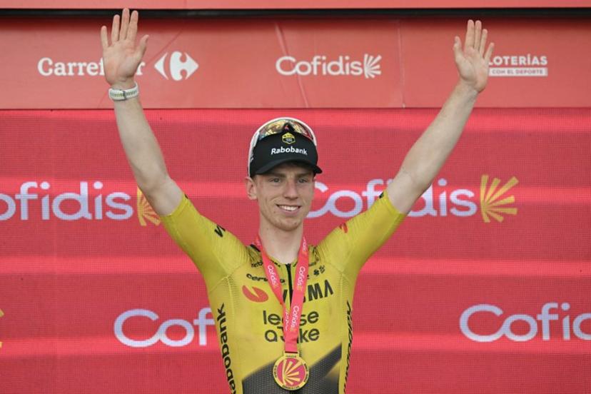 Team Visma-Lease a bike's British rider Matthew Brennan celebrates on the podium after winning the 17th stage of the Vuelta a Espana 2026 cycling tour, a 185 km race between Dos Hermanas and Seville, on September 9, 2026.   JORGE GUERRERO / AFP